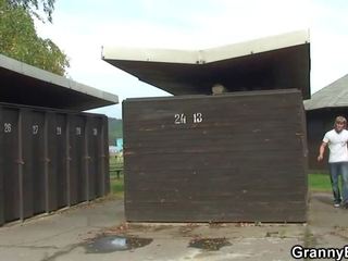 He fucks blonde grandma near public changing room